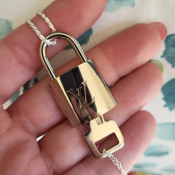 Louis Vuitton Jewelry - Silver Louis Vuitton Padlock only paired w/  sterling silver chain ⛓️